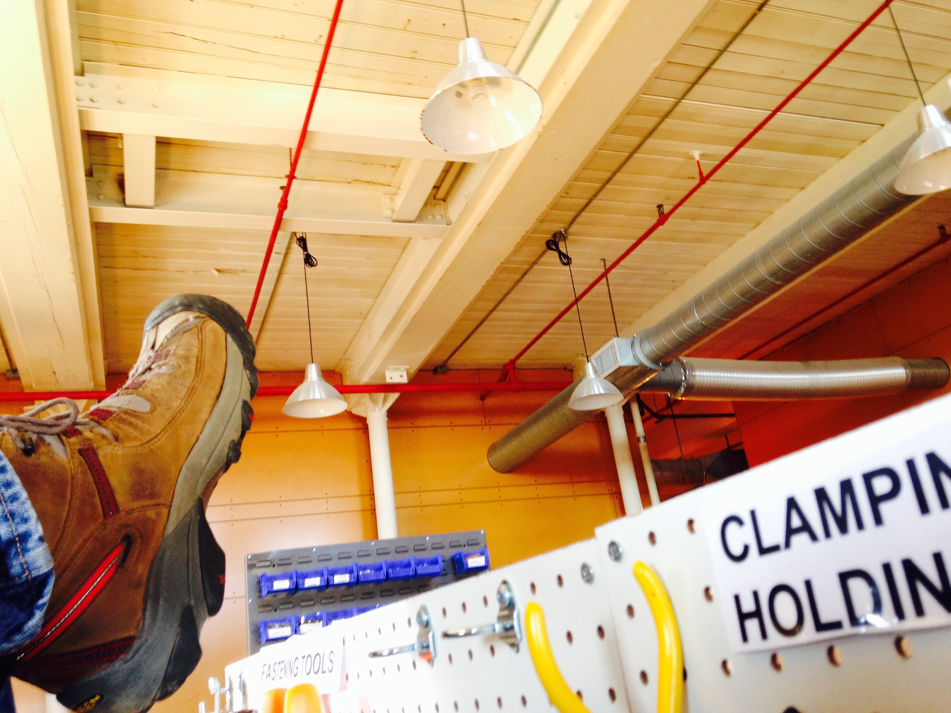 Doug laying on lab table / sore back